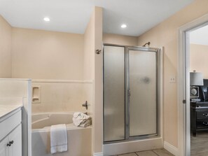 Shower, jetted bath, towels, toilet paper