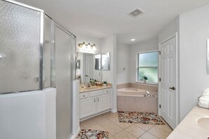 Jetted bath, hair dryer, towels, soap