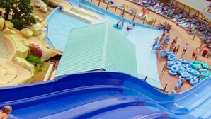 A water park with multiple slides and a pool area. - Lakeview Cabin w/ Hot Tub, Pool, Decks - Sleeps 20 (Branson)