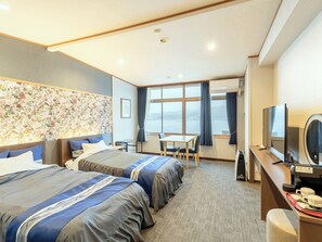 Habitación con 2 camas individuales, no fumadores, vistas al mar | Caja fuerte, escritorio, wifi gratis