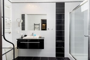 Shower, hair dryer, towels