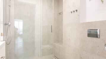 Shower, free toiletries, hair dryer, towels