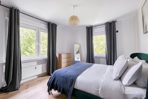2 chambres, fer et planche à repasser, Wi-Fi, draps fournis