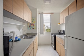 Apartamento | Cocina privada | Frigorífico