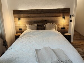 2 dormitorios, tabla de planchar con plancha, wifi gratis y ropa de cama