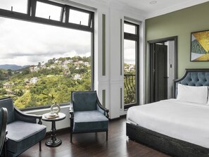 Premium bedding, down duvets, memory-foam beds, desk