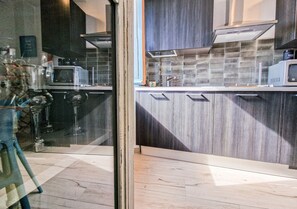 Fridge, microwave, stovetop, high chair