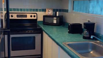 Apartment, Ocean View | Private kitchen | Fridge, paper towels