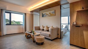 エグゼクティブ スタジオスイート | 羽毛の掛け布団、ノートパソコン用作業スペース、WiFi (無料)、ベッドシーツ