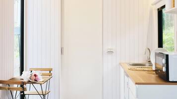 Fridge, microwave, stovetop, coffee/tea maker