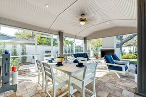 Outdoor dining - Luxury Home, Heated Saltwater Pool, 5-Min to the Beach! (Seminole)