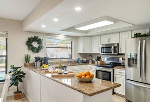 Fridge, microwave, oven, stovetop - Luxury Home, Heated Saltwater Pool, 5-Min to the Beach! (Seminole)