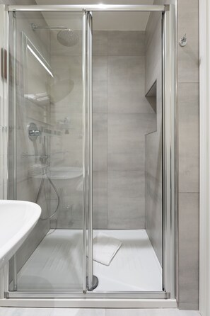 Hair dryer, bidet, towels, soap