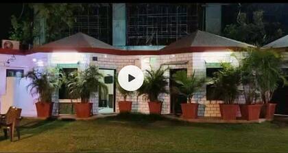 Walking distance jaipur international airport terminal2 big garden area room.