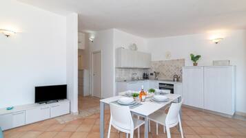 Apartamento família, 3 quartos, 2 banheiros (Feel So Good) | Sala de jantar