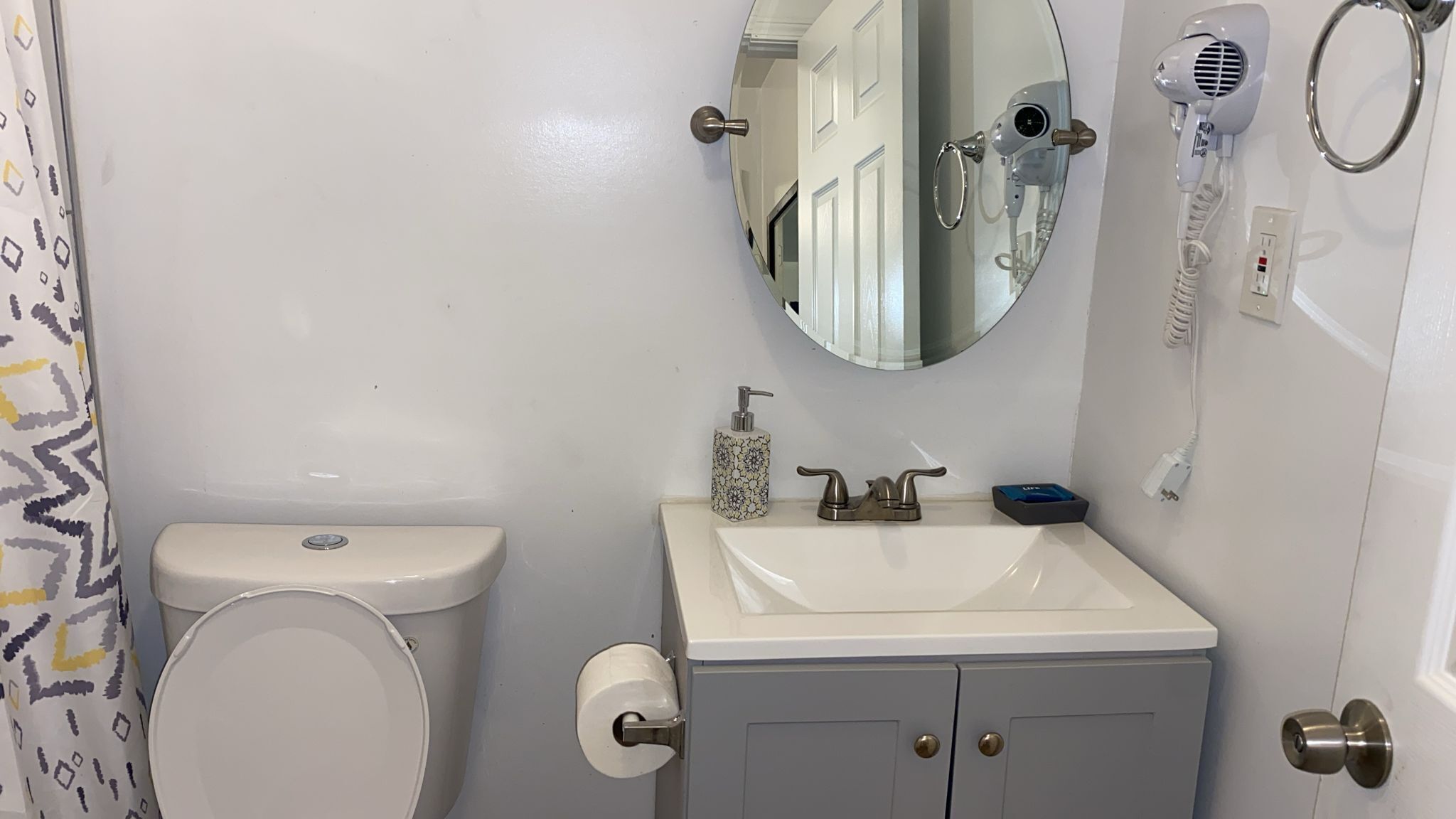 Hair dryer, towels, soap, shampoo