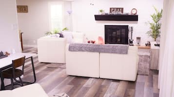 Smart TV, fireplace, books