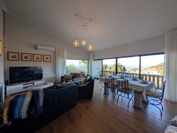 Smart TV, fireplace, video game console, table football