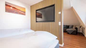 1 habitación, tabla de planchar con plancha, wifi gratis y ropa de cama