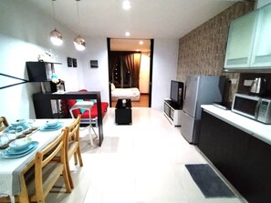 Standard Apartment, 1 Bedroom, City View | Down comforters, pillowtop beds, iron/ironing board, free WiFi