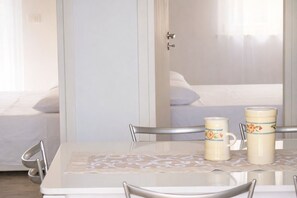 Luxury Apartment, Air conditioning, Sea View | Living area | Flat-screen TV