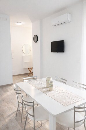Luxury Apartment, Air conditioning, Sea View | Living area | Flat-screen TV - BLOOM Tropea (Ricadi)