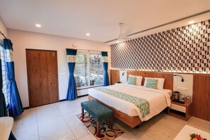 Private Cottage - King Bed - Pool view - Sitout