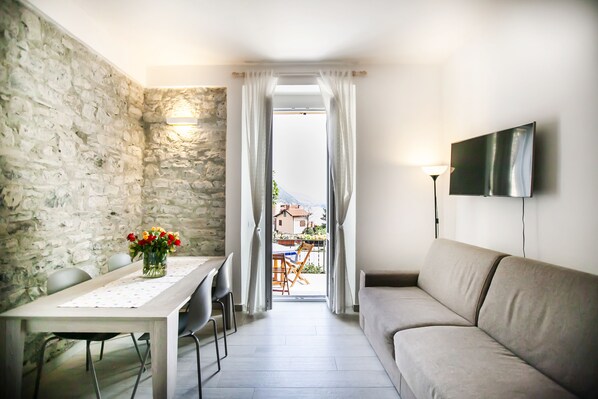 Apartamento panorámico | Zona de estar | Una televisión de pantalla plana