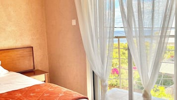 Standard Double Room, Kitchen, Partial Sea View | Desk, laptop workspace, soundproofing, iron/ironing board (on request)