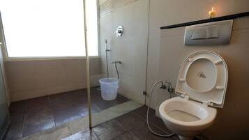 Shower, slippers, bidet, towels