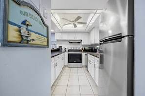 Fridge, microwave, oven, stovetop - Oceanfront escape near beach w/ pool (Cocoa Beach)