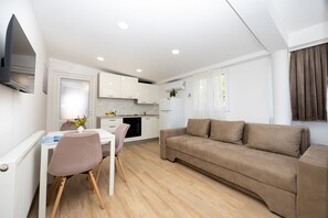 Apartamento | Área de estar | TV