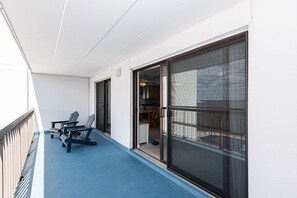 Outdoor dining - Modern, Colorful 2 Bedroom Condo with Free WiFi, an Outdoor Pool, and Gorgeous Suede Furniture Overlooking the Breathtaking Marshes and Bay a Block and a Half to Beach! (Ocean City)