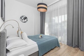 1 habitación, tabla de planchar con plancha, cuna de viaje y wifi 