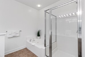 Shower, jetted tub, towels