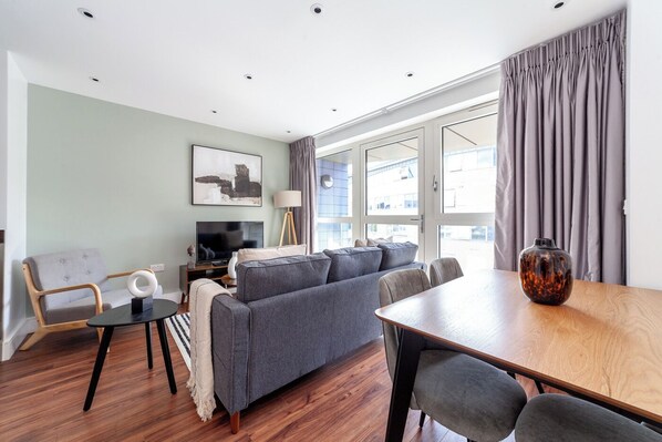 Apartment | Living area | 37-inch TV with satellite channels, Netflix, streaming services - The Highbury Collection (London)