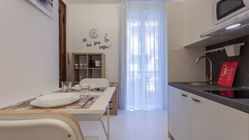 Fridge, microwave, coffee/tea maker, electric kettle