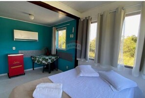 1 quarto, roupas de cama antialérgicas, frigobar