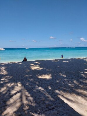 On the beach, white sand, 3 beach bars