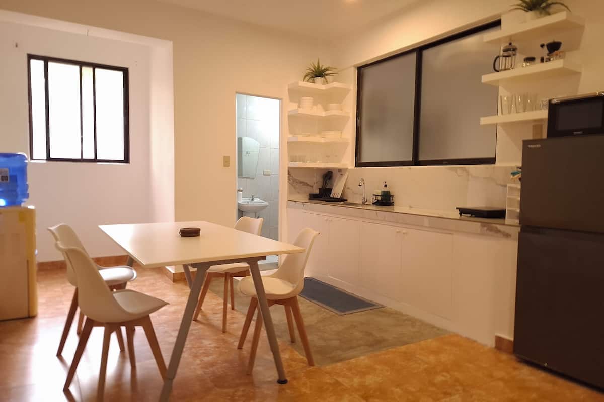 Family Apartment, Multiple Beds, Kitchen, Beachfront | Dining room
