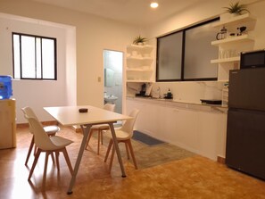 Family Apartment, Multiple Beds, Kitchen, Beachfront | Dining room