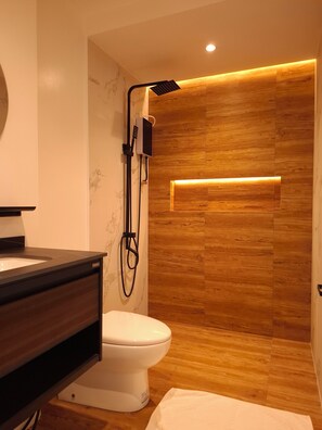 Superior Studio, 1 King Bed, Kitchen, Beachfront | Bathroom | Shower, rainfall showerhead, bidet, towels - Boracay Luxury Apartments (Boracay Island)