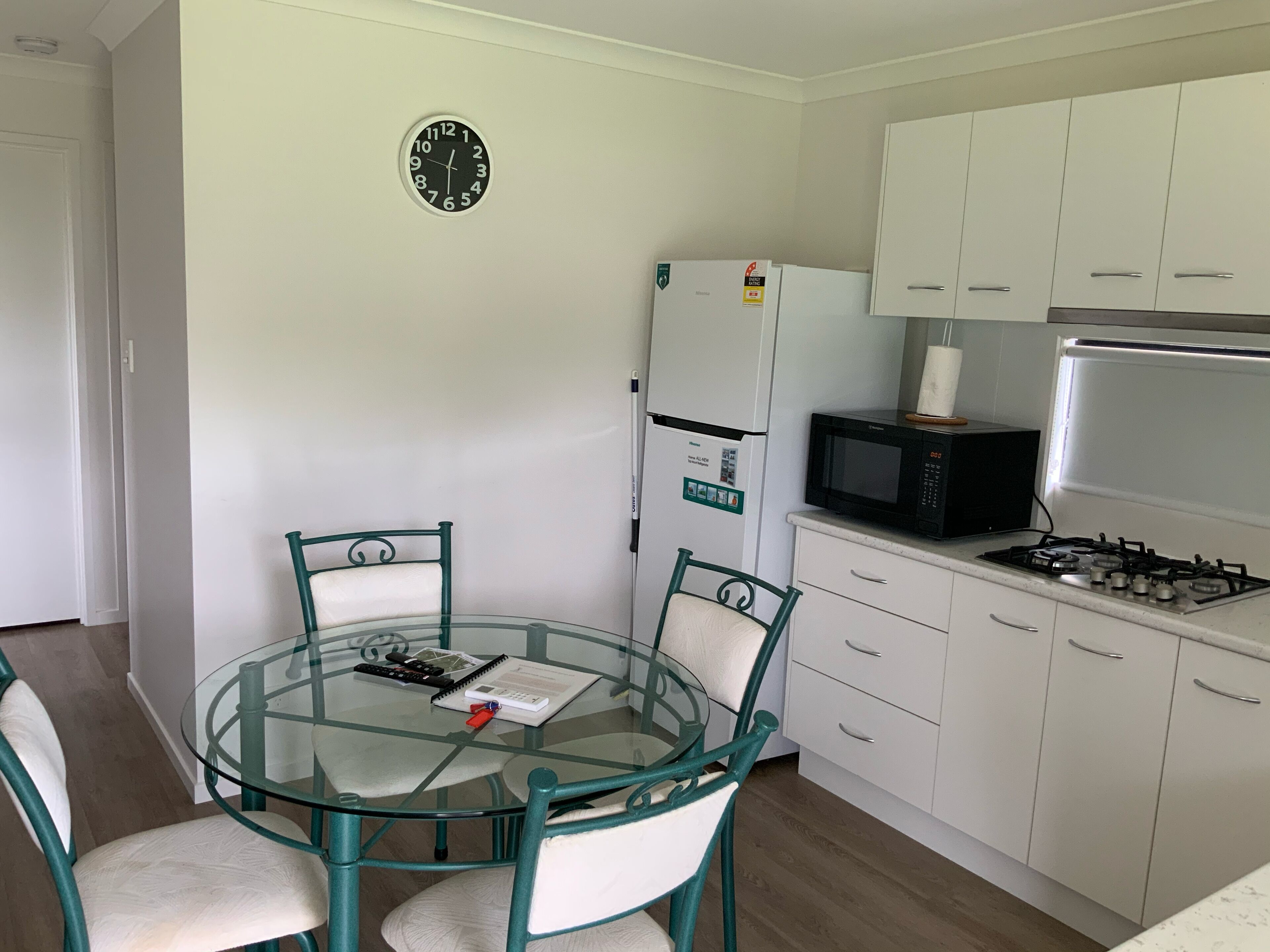 Full-sized fridge, microwave, stovetop, electric kettle