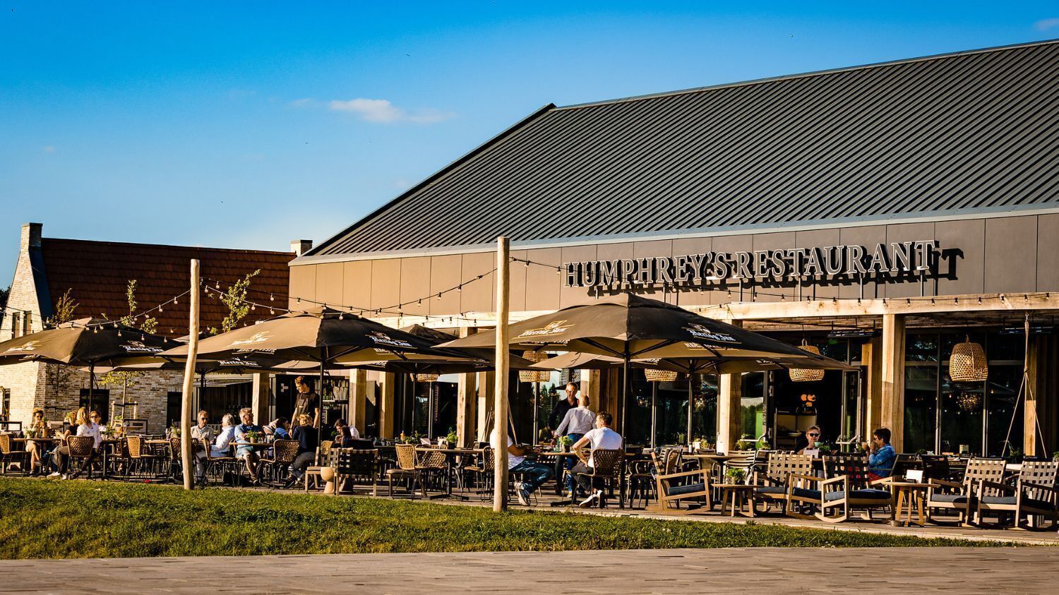 Humphrey's Restaurant with outdoor seating and umbrellas.