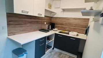 Fridge, microwave, coffee/tea maker, toaster