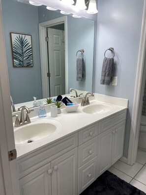 Hair dryer, towels, soap, shampoo