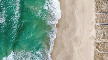 Beach nearby, sun loungers, beach towels