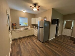 Fridge, microwave, coffee/tea maker, toaster