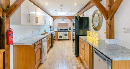 Experience sociable luxury with all ground floor amenities.