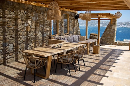 Outdoor dining. Villa Pelagos with amazing view close to the sea